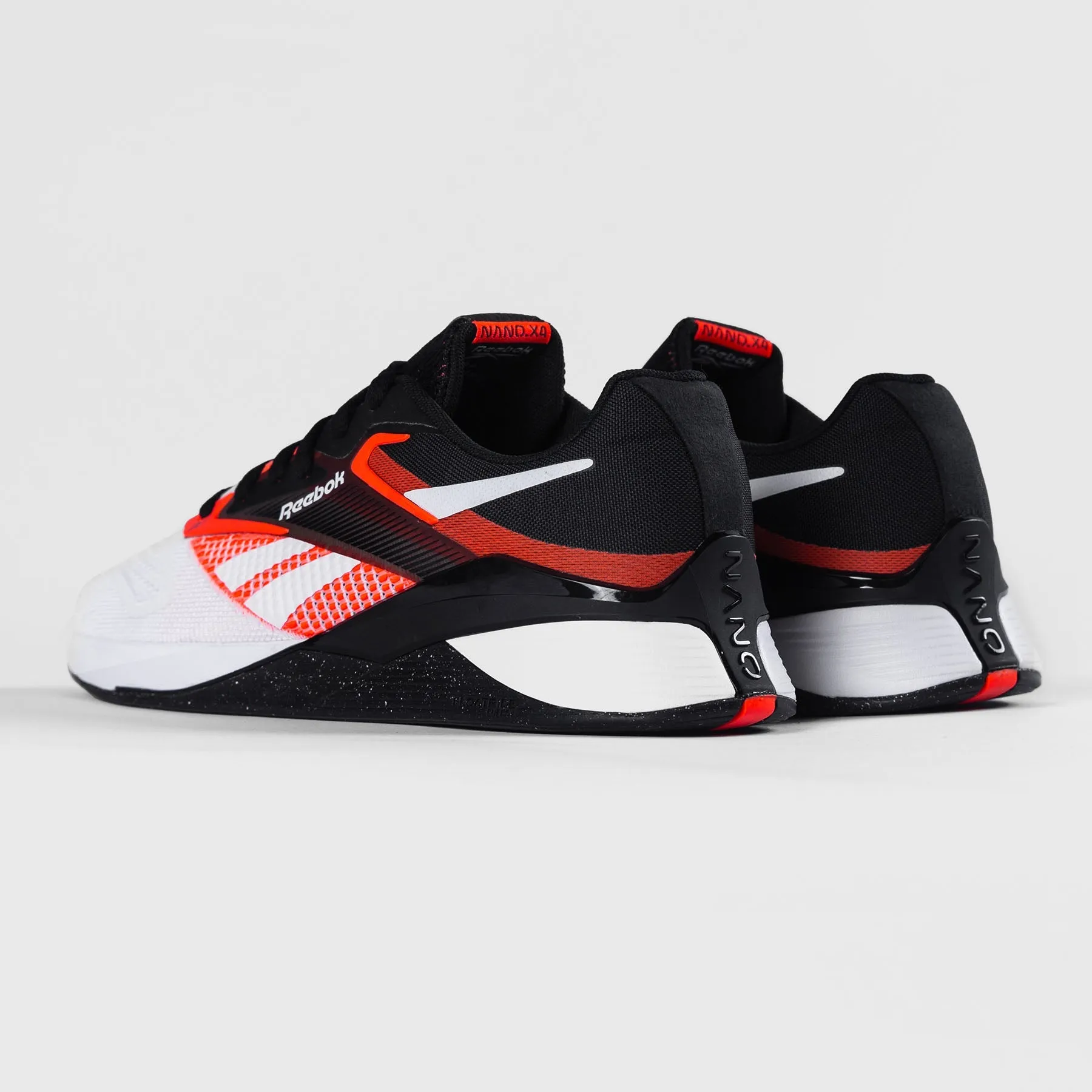 Optimized Title: Reebok Nano X4 Mens Training Shoes - Black/White/Orange Flare - Versatile Performance Footwear