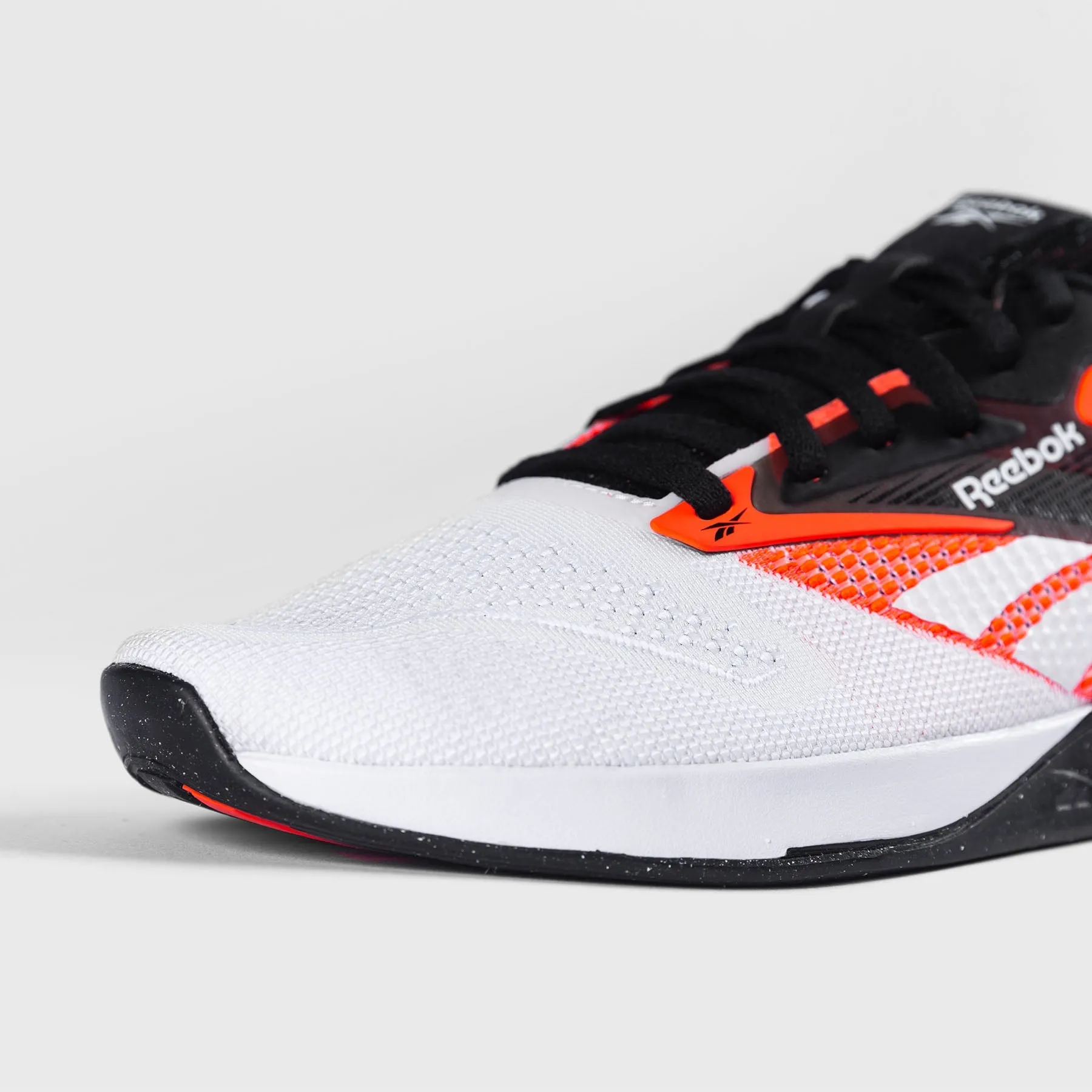 Optimized Title: Reebok Nano X4 Mens Training Shoes - Black/White/Orange Flare - Versatile Performance Footwear