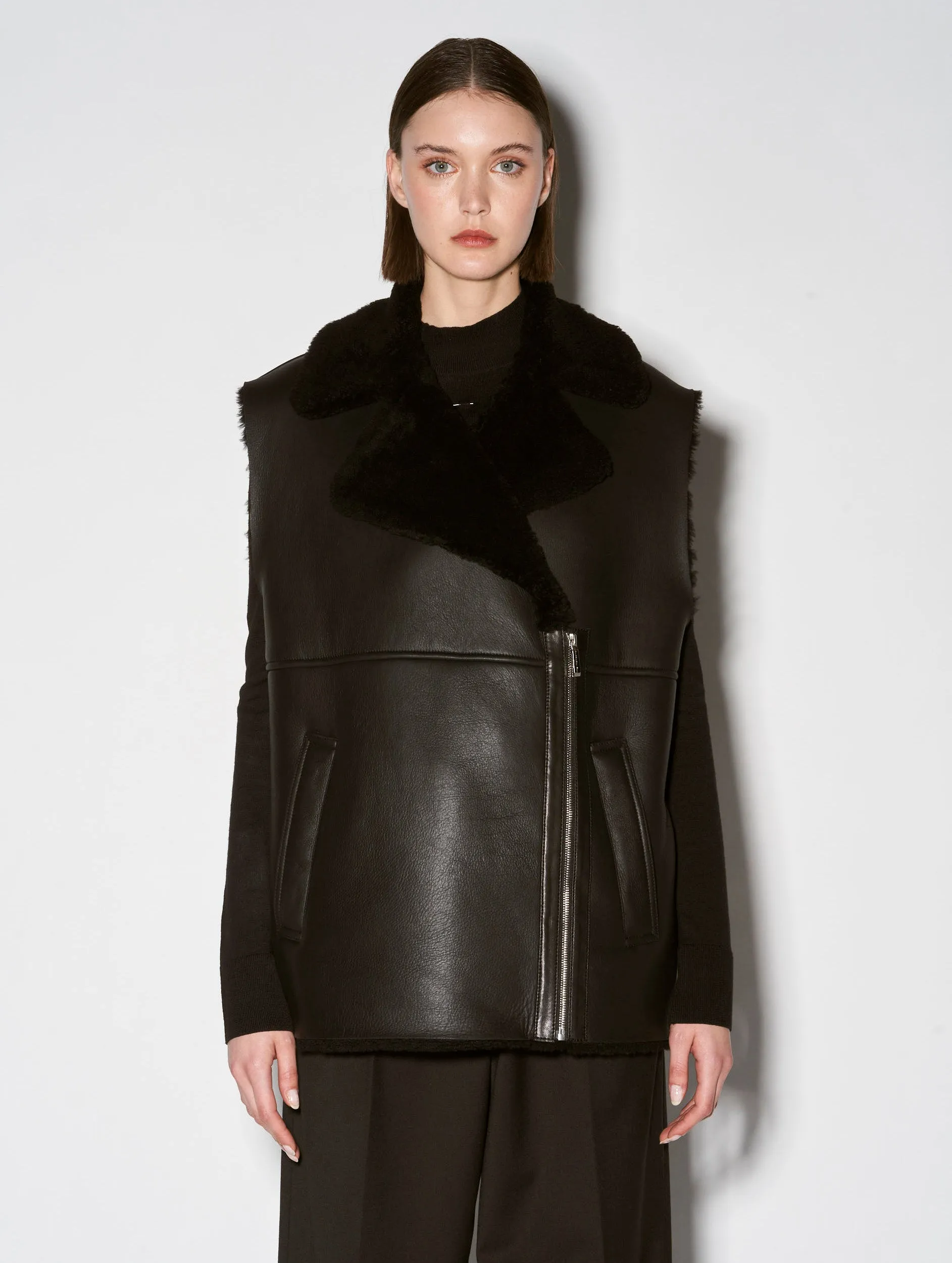 Sleeveless black shearling jacket